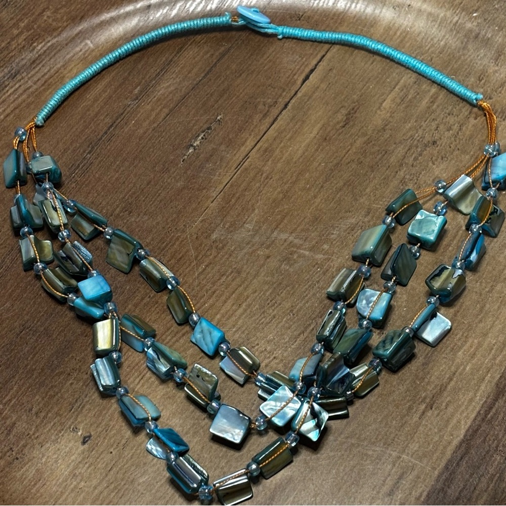 Beautiful multi strand shell necklace, dyed blue, artisan handmade